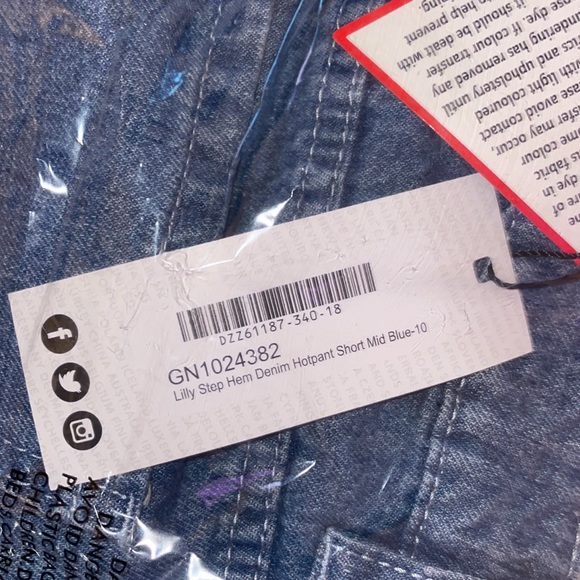 Lilly Step Hem Denim Hotpant Short Mid Blue - Picture 2 of 2